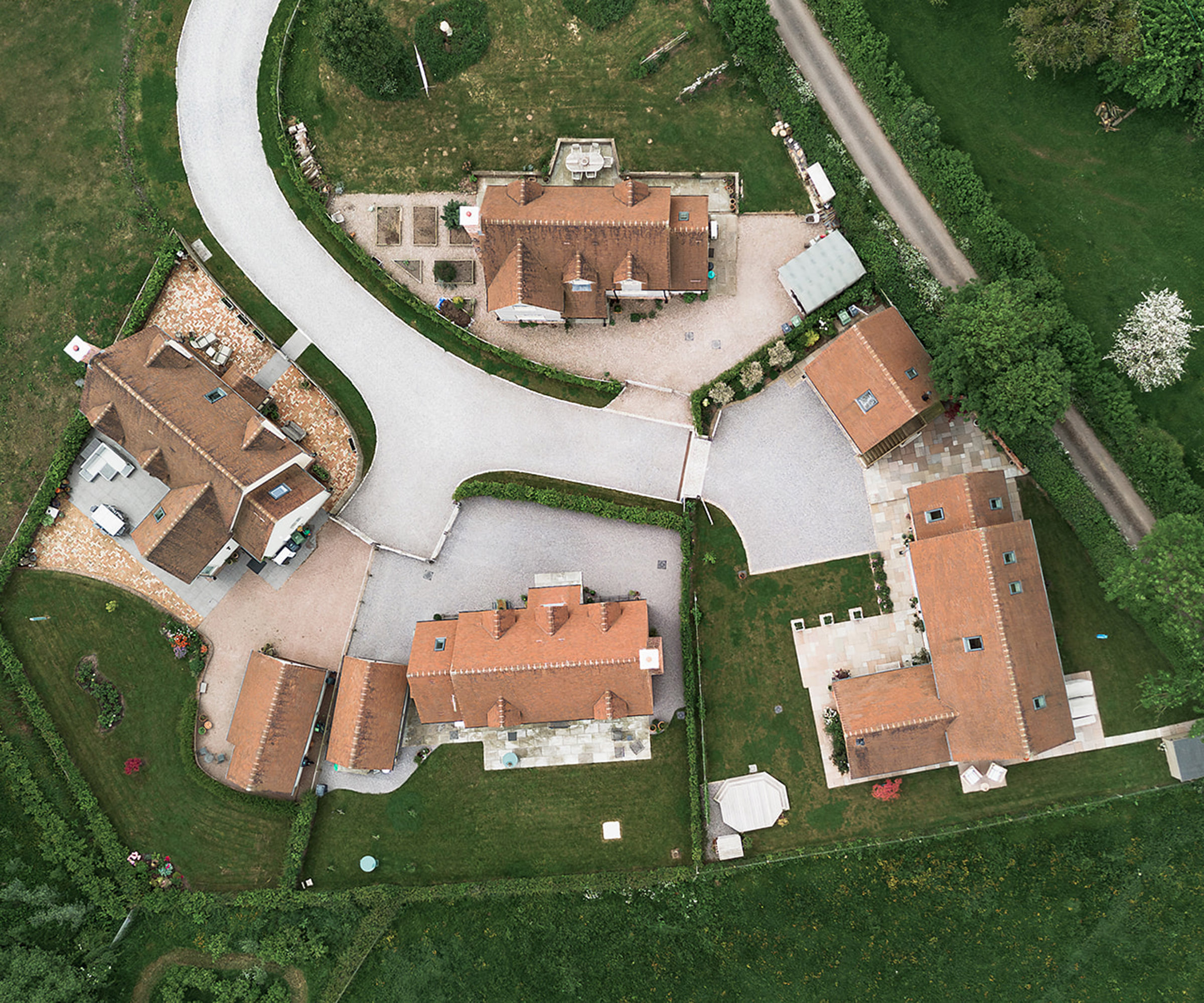 Aerial view of a custom build development in Hereford with multiple plots